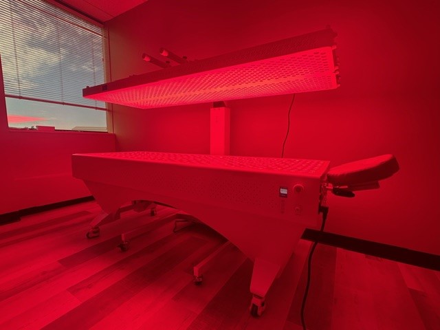 dr jamie bovays red light therapy machine in his denver clinic kinetik chain